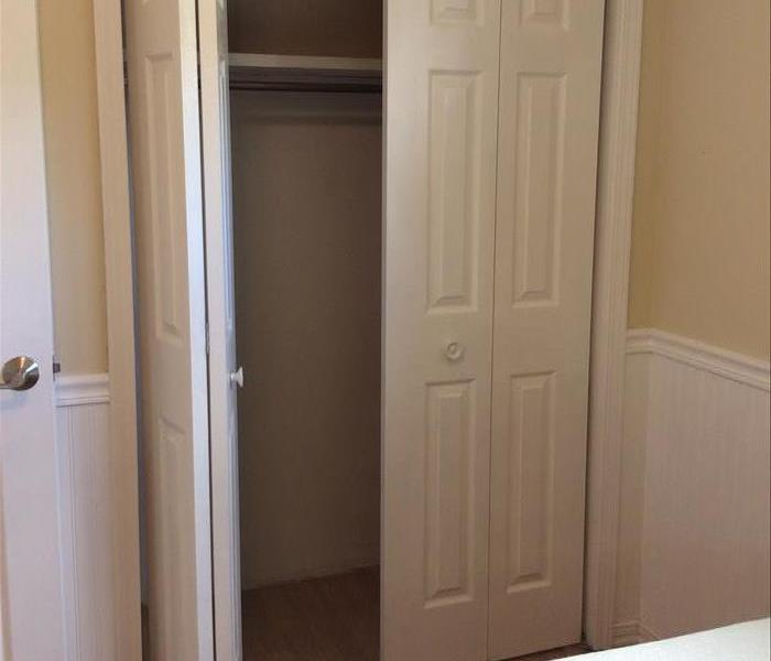 Clean empty bedroom closet