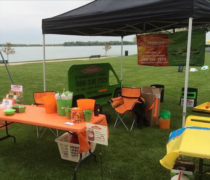 SERVPRO tent and table with literature and giveaway items